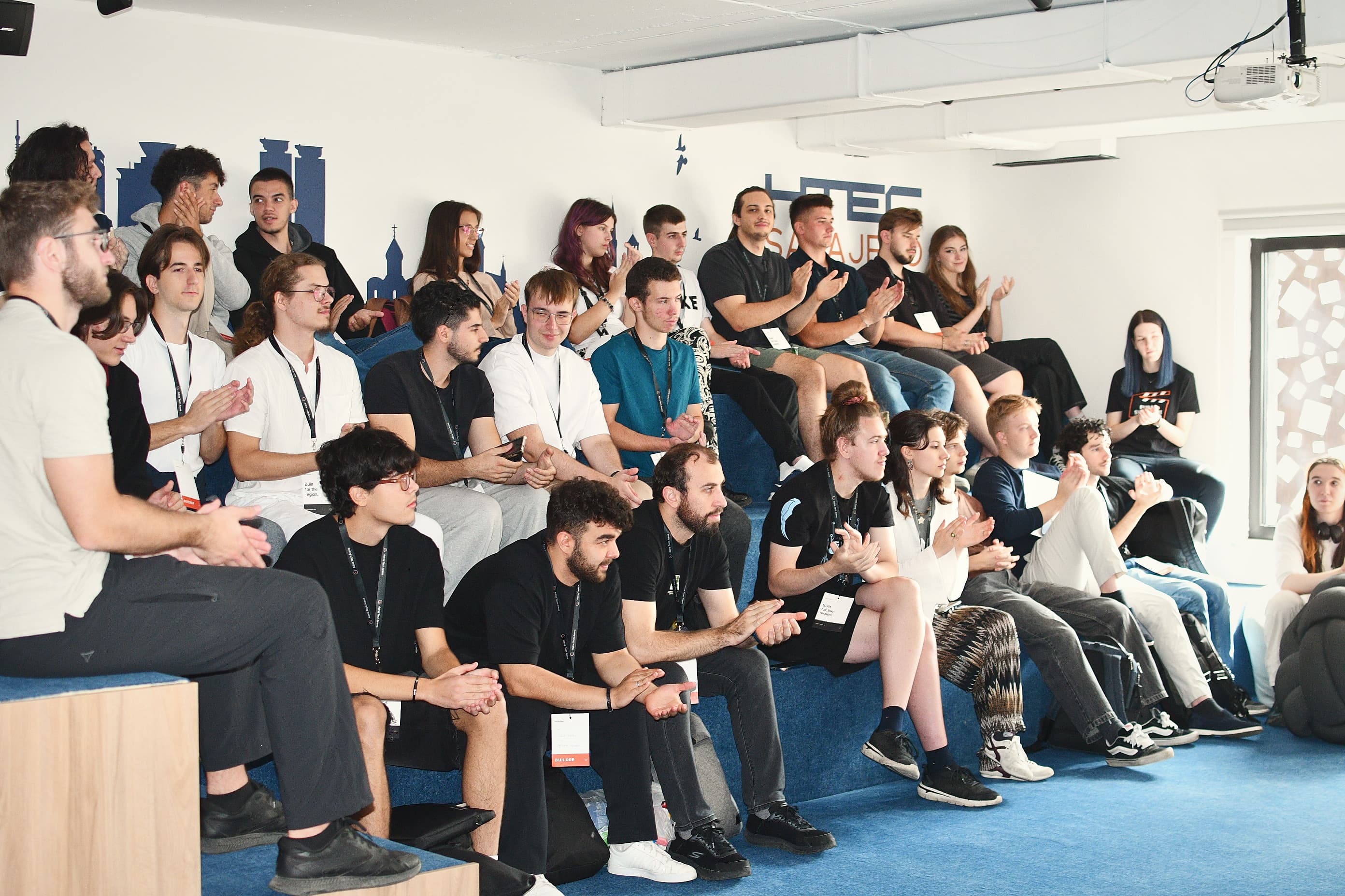 The room applauding during the opening of Adria Hack Sarajevo at HTEC.