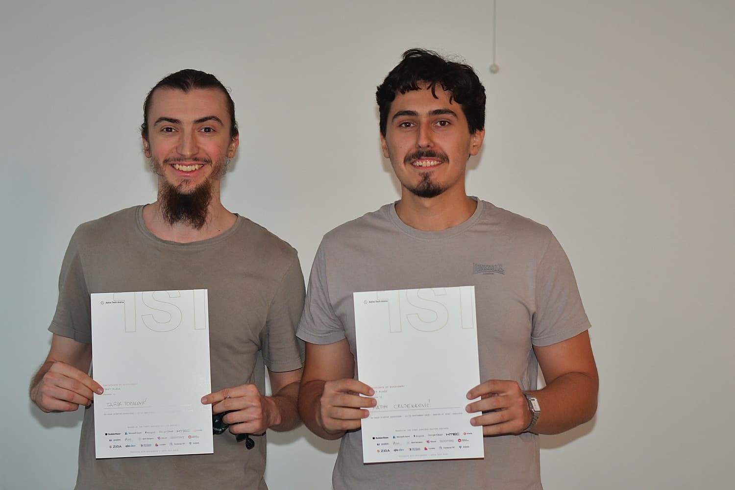 The two-person MediScribe team holding their first-place certificates after the Adria Hack Sarajevo final.